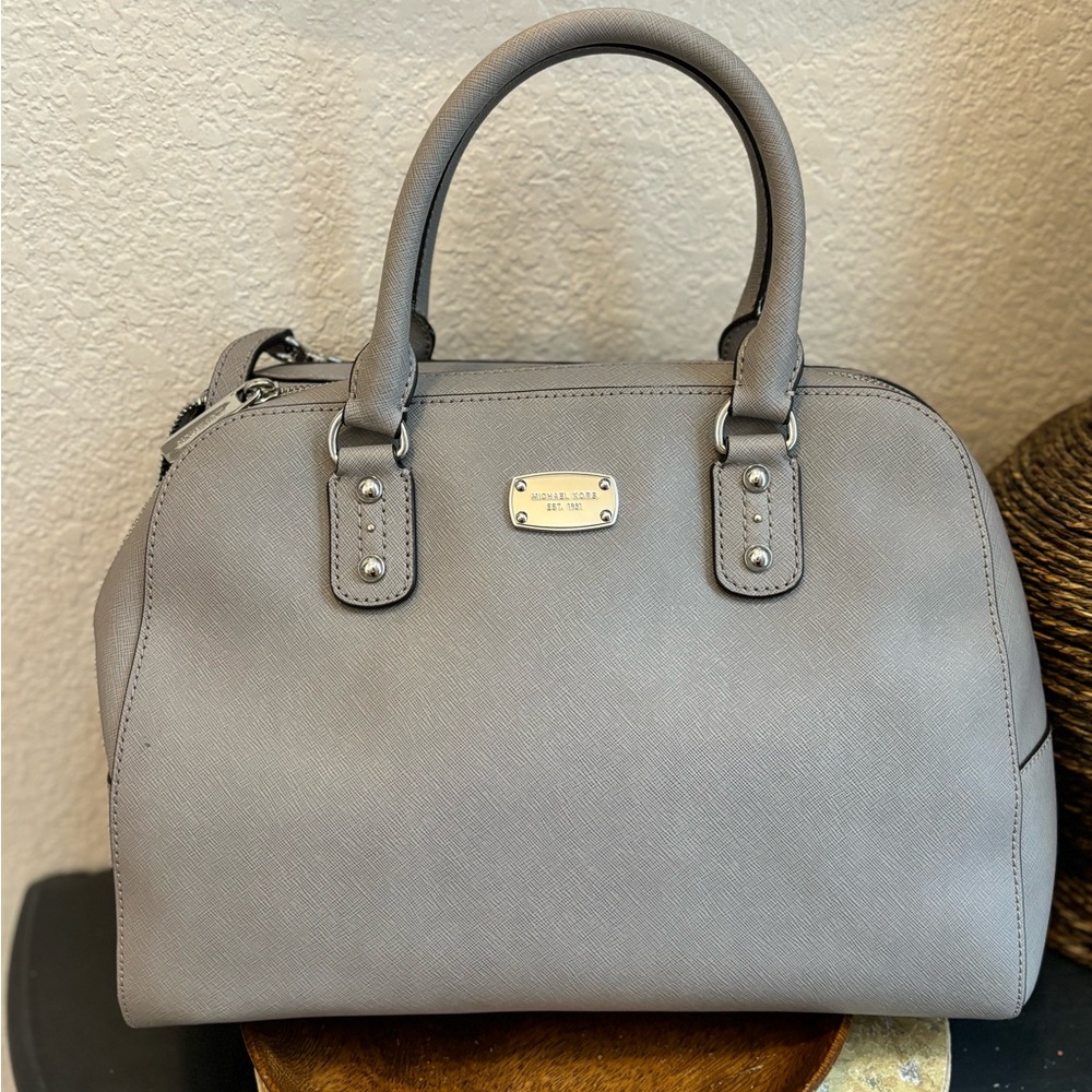 Michael Kors with tags attached